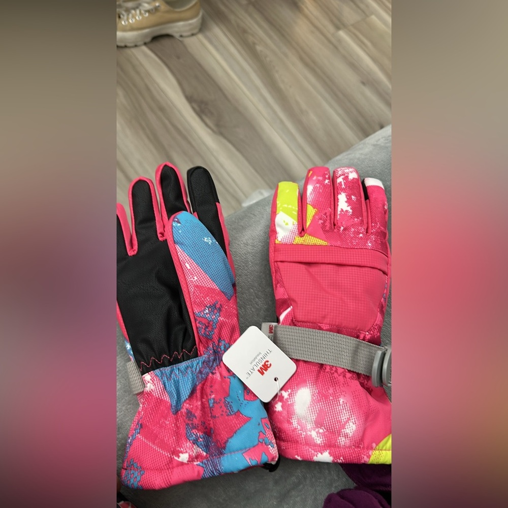 2 pairs of brand new gloves kids large and 
Women’s medium